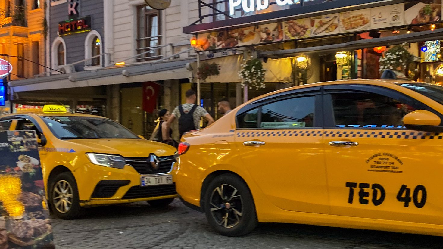 two yellow istanbul taxis - istanbul travel tips