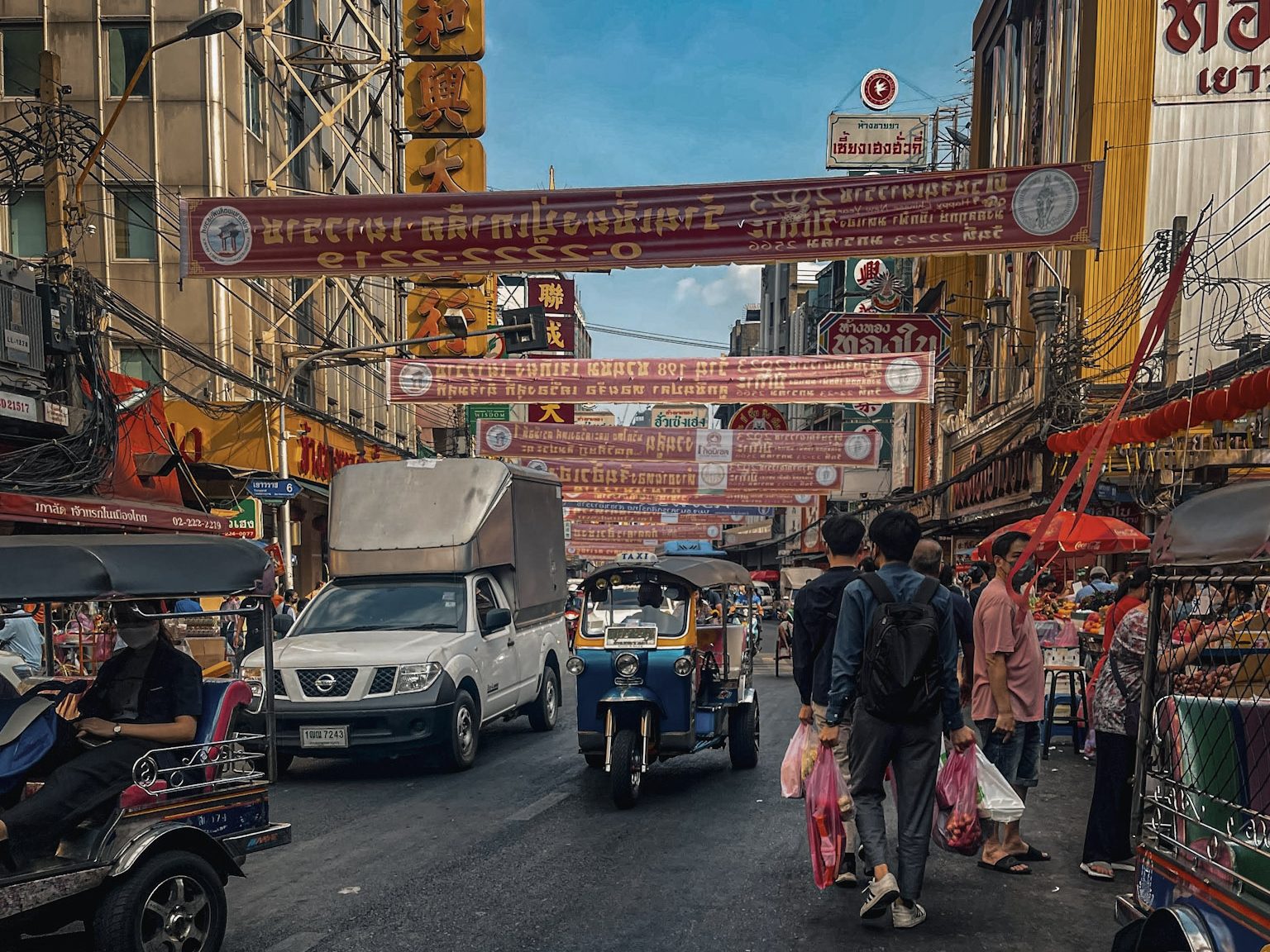 tuk tuks on streets of Chinatown Bangkok