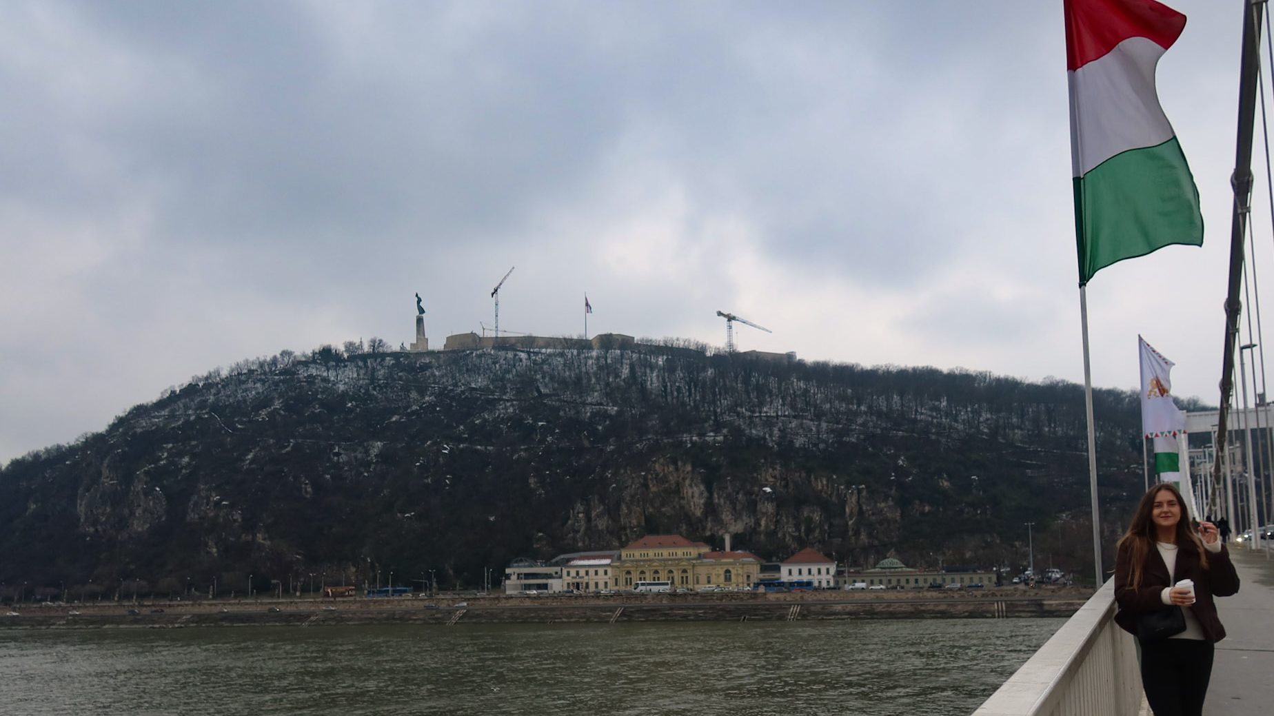 view of gellert hill from Erzsébet Bridge in Budapest - Tara O'Reilly travel blogger
