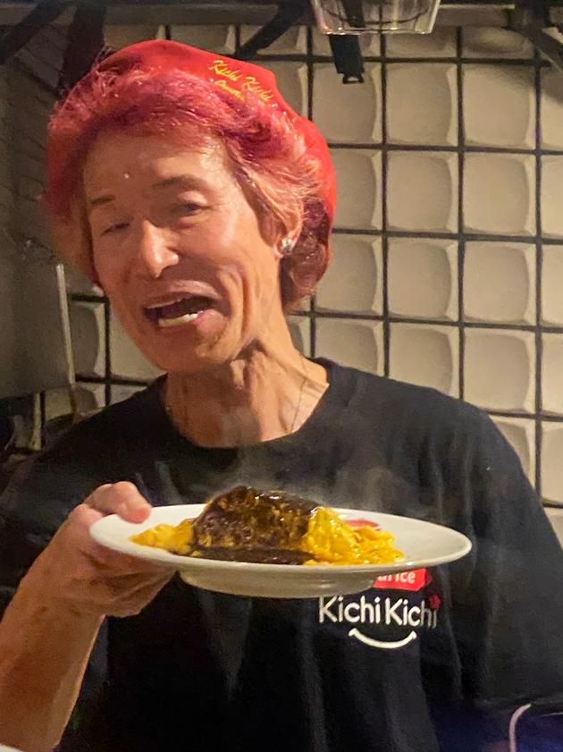 Chef Motokichi Yukimura in the kitchen, serving his famous omurice