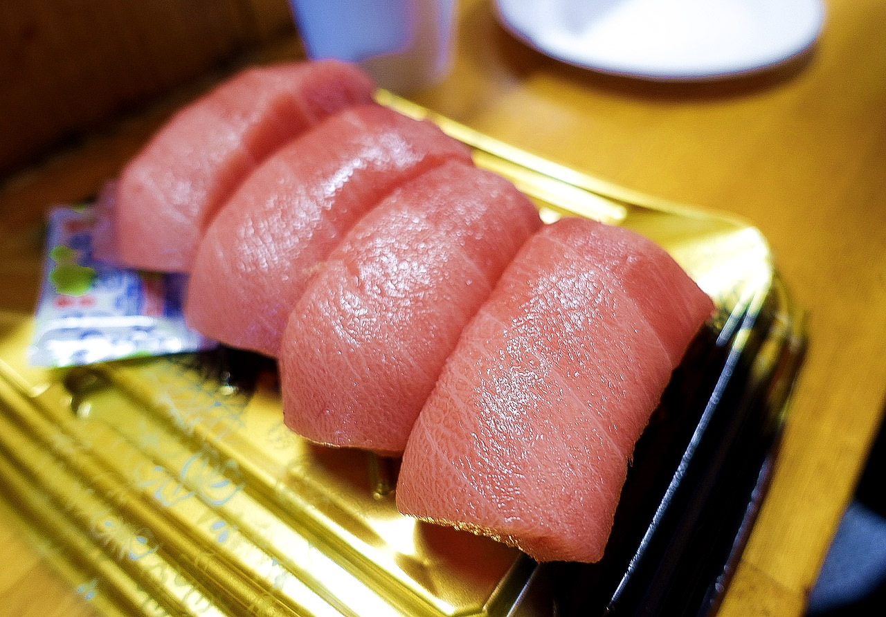 blue fin tuna at eating at Kuromon Ichiba Market