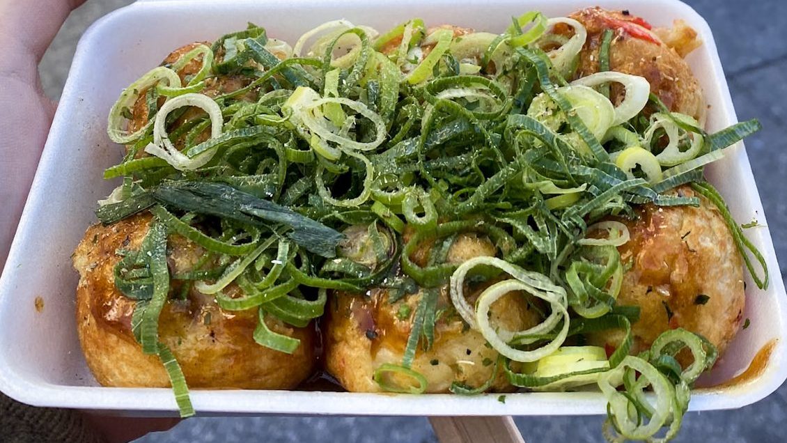 eating takoyaki is one of the best things to do in Osaka