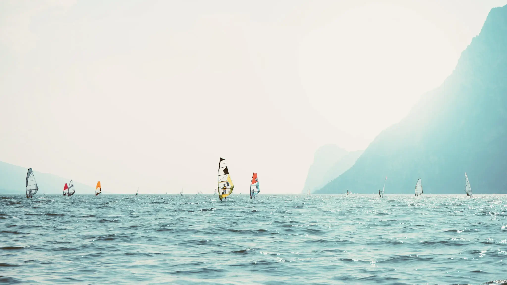 windsurfing in lake garda is sure to add some adrenaline to your trip