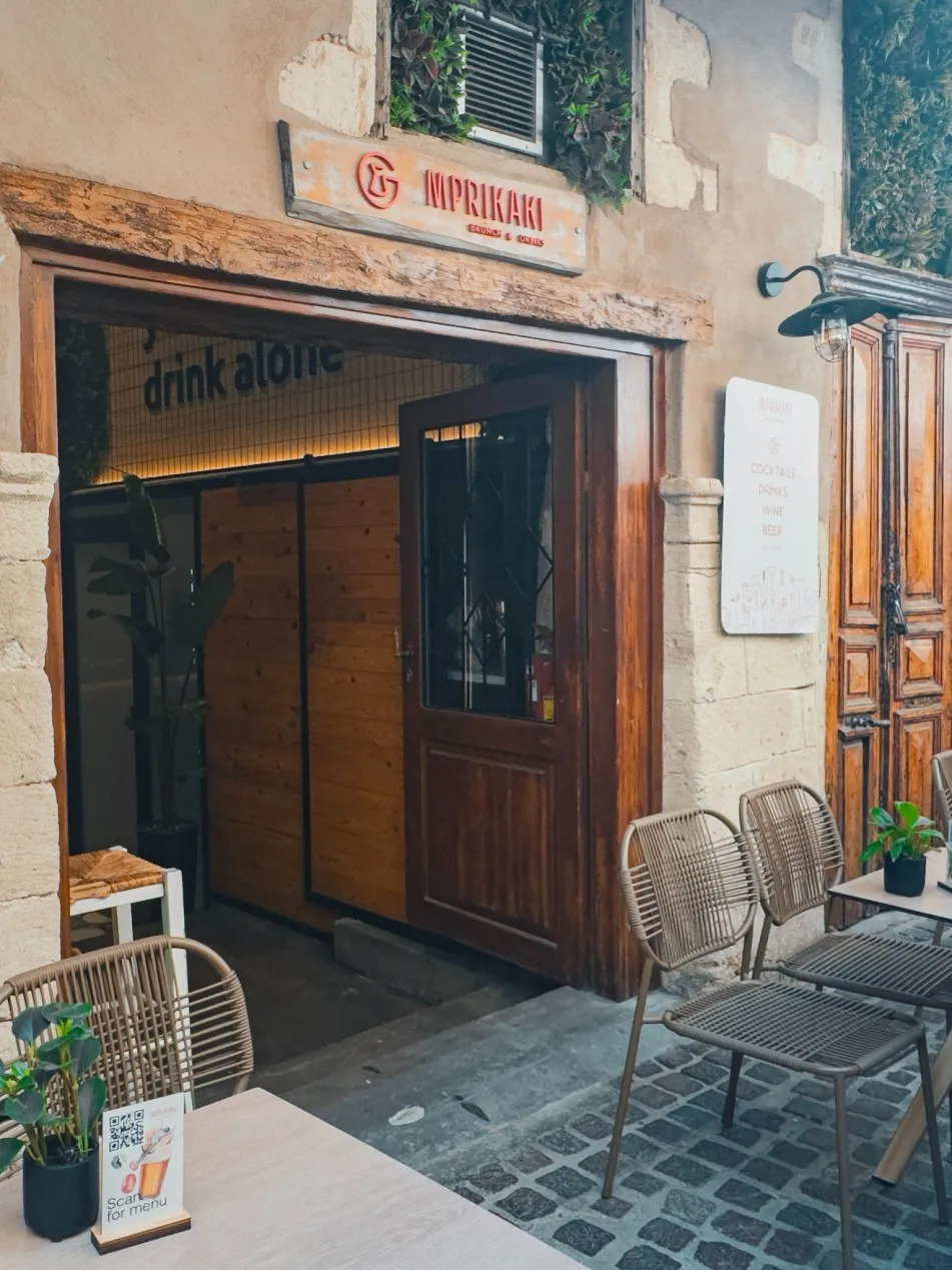 Alleyway seating outside To Brikaki cafe in Chania old town