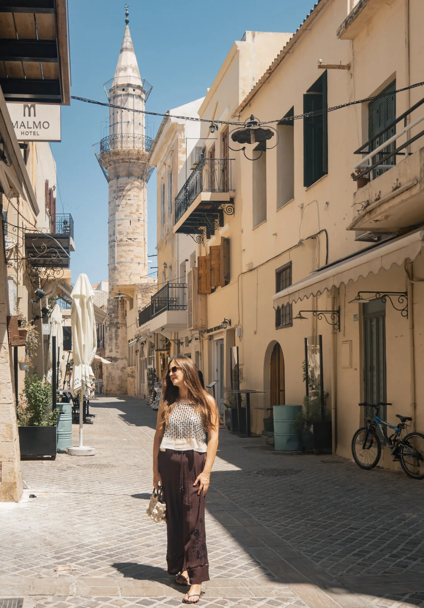 tara o'reilly walking around Splantzia in Chania Ahmet Ağa Minaret