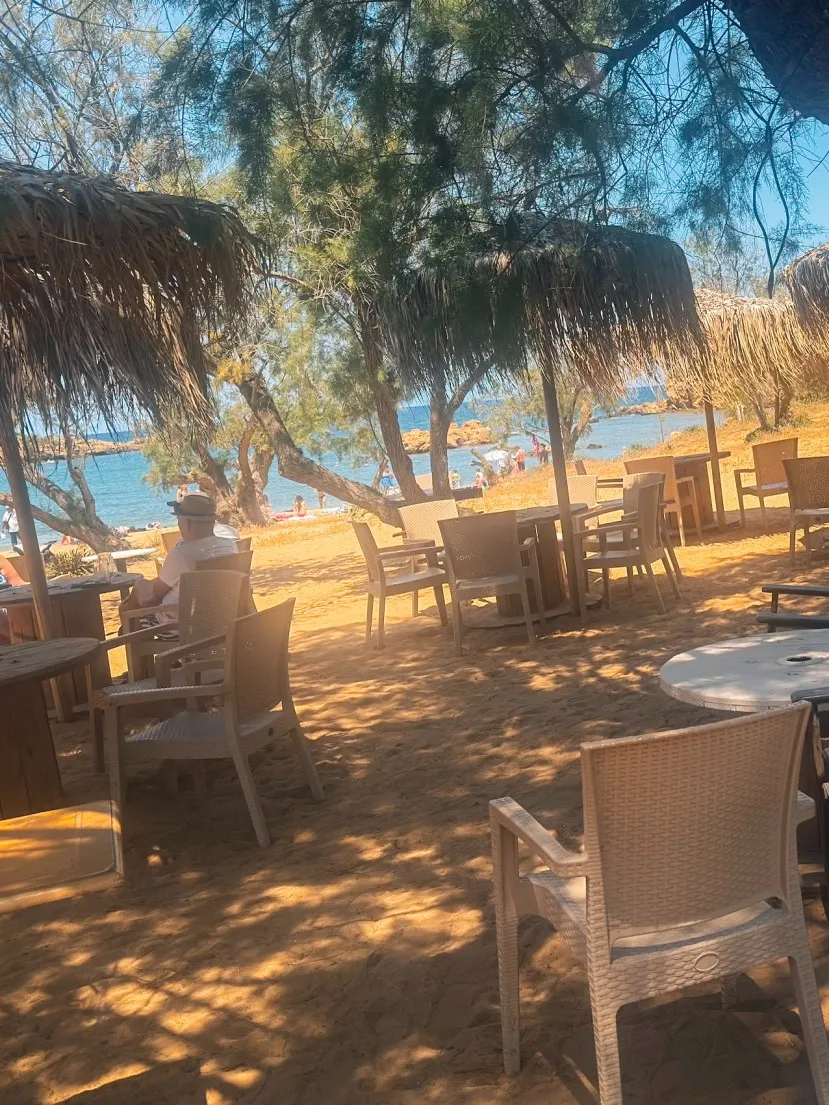 Parasol seating on the sand at Giorgio's Kantine, Yannis Beach