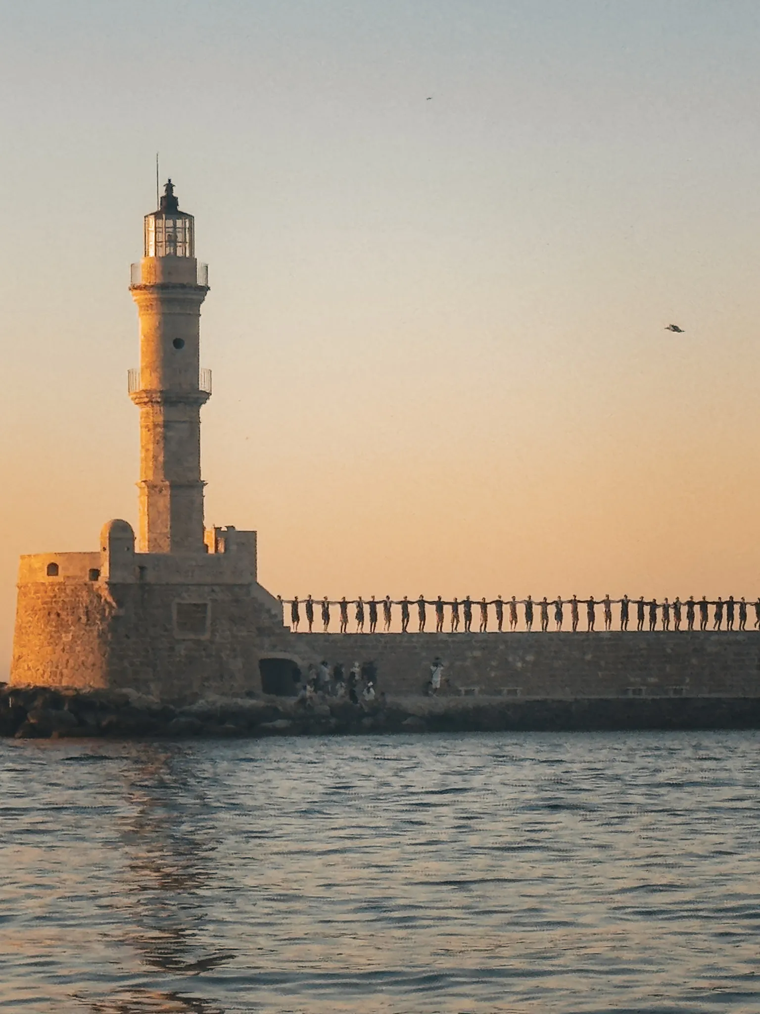 chania lighthouse at sunset