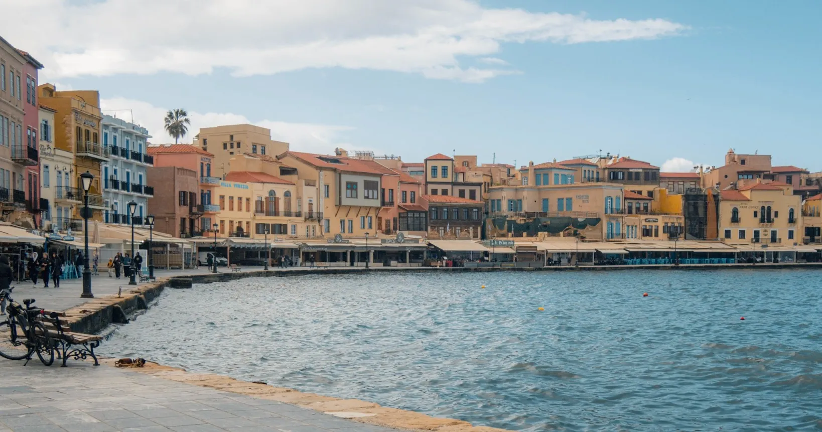 colourful building along chania's venetian harbour