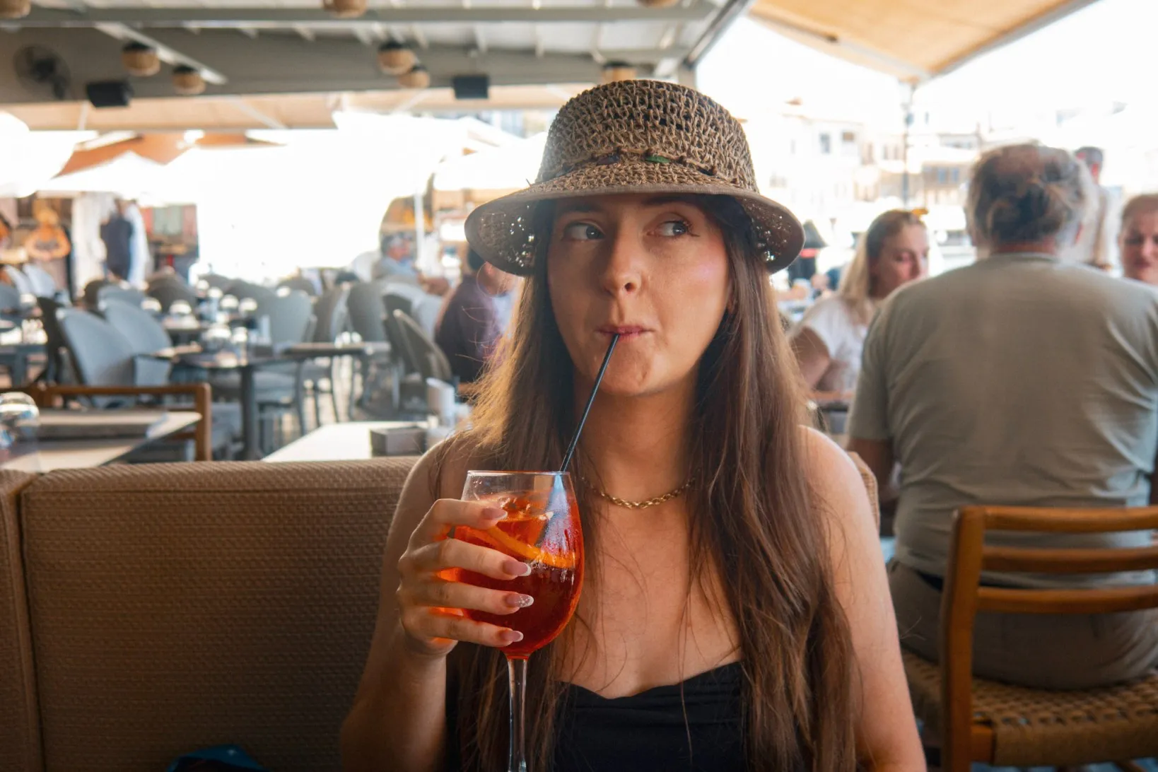 tara o'reilly drinking cocktails in chania