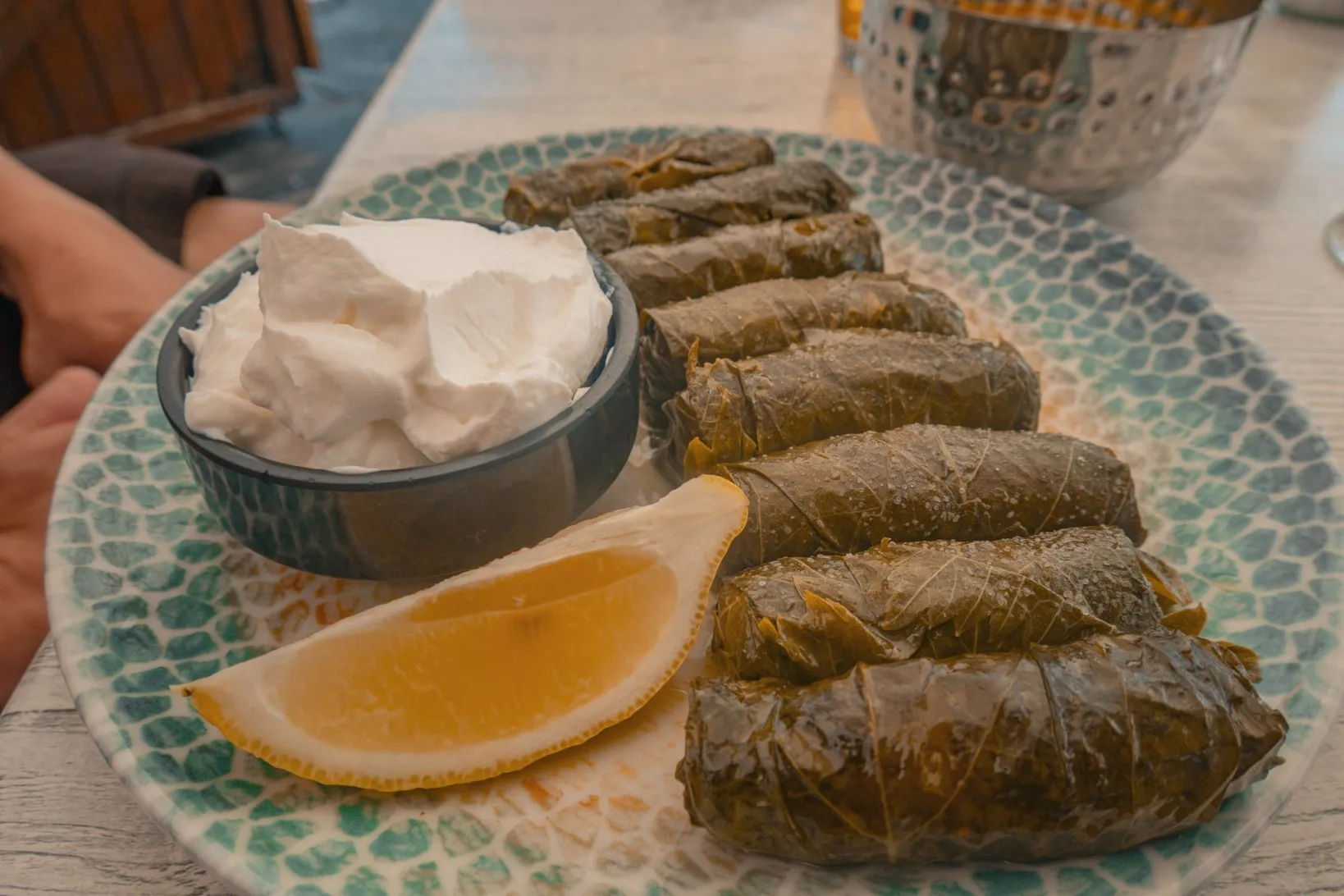 Dolmades with tzatziki and lemon