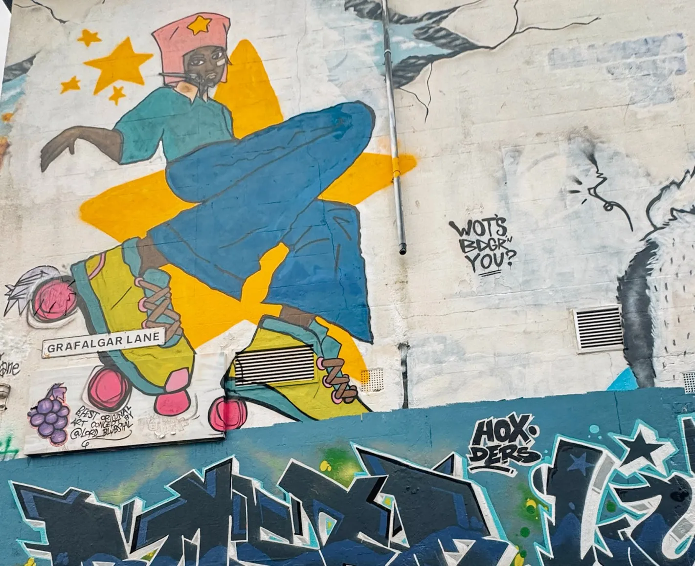 Trafalgar Lane mural or black woman in rollarskates