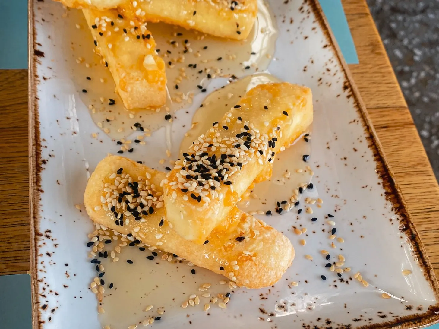 saganaki is a must try food in greece