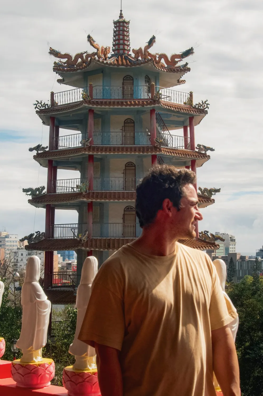 Bobby Maher standing in front of Longfeng Baoyu Pagoda TAITUNG